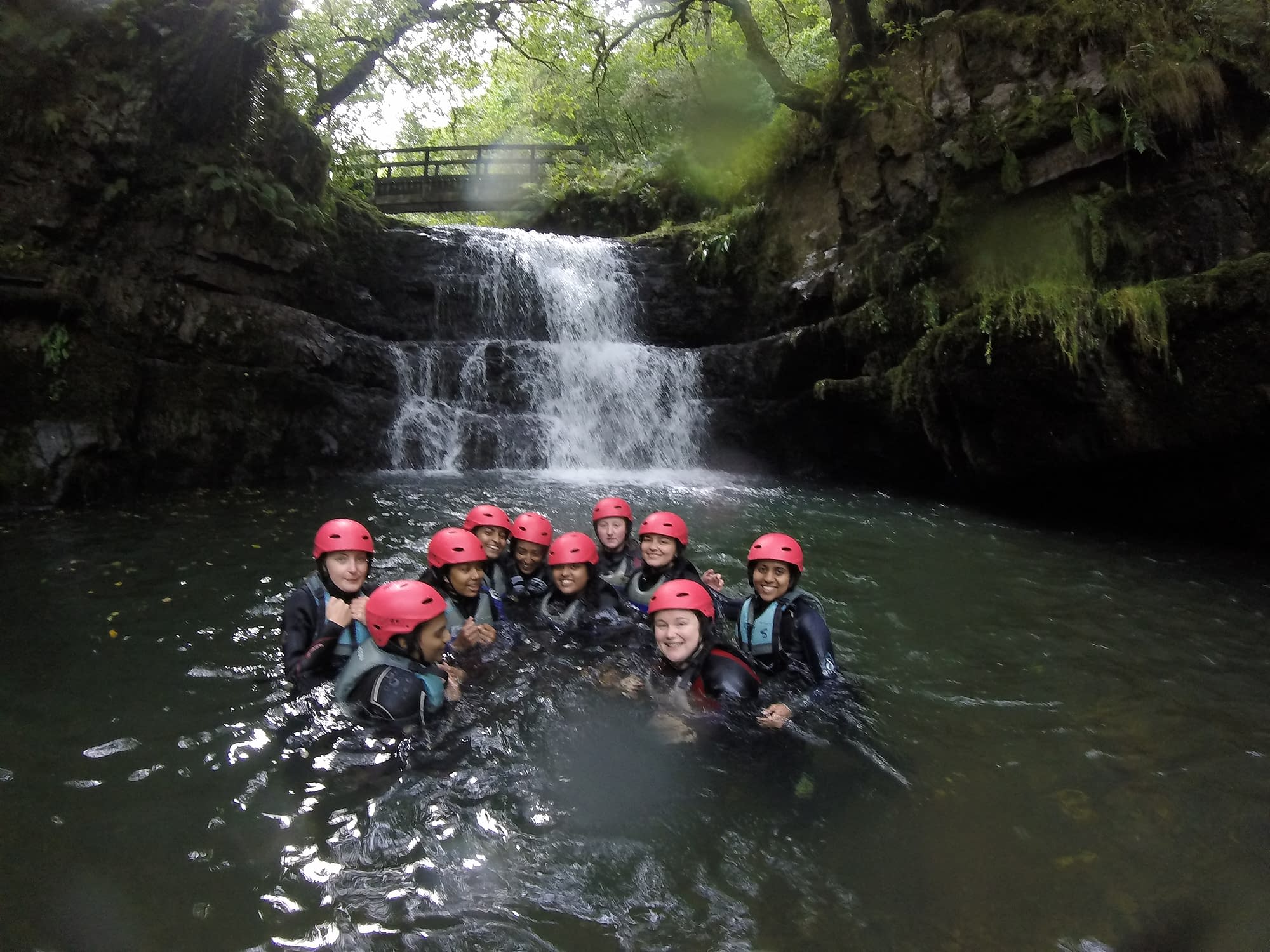 Hen Party in the waterfall pool during Gorge Walking activity