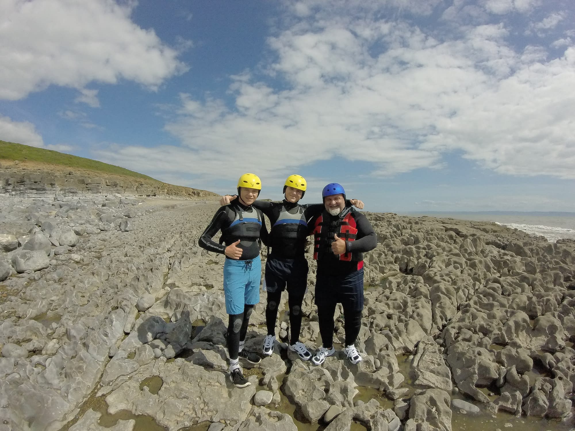 Group of 3 all set for their coasteering activity